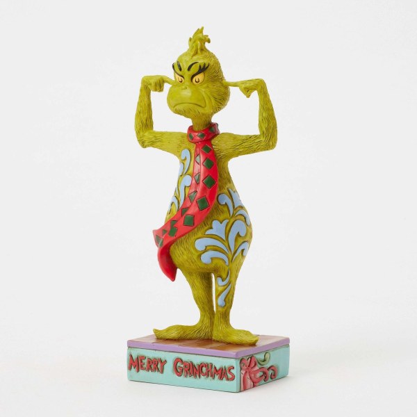 GRINCH SE BOUCHANT LES OREILLES