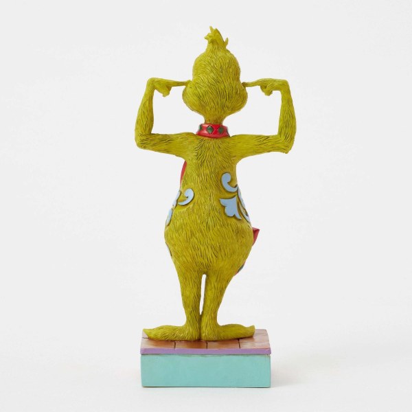 GRINCH SE BOUCHANT LES OREILLES