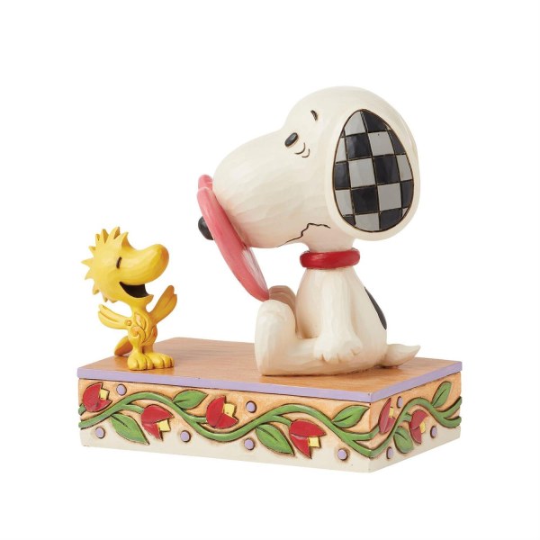 Snoopy avec le nez dans le cœur - Peanuts