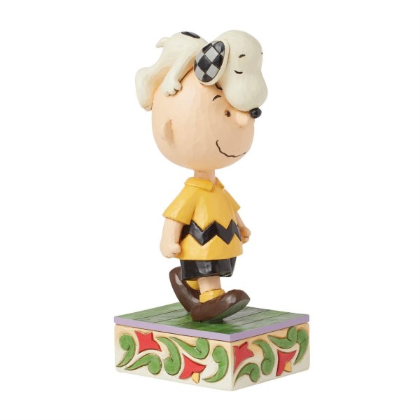 Snoopy sur la tête de Charlie Brown - Peanuts
