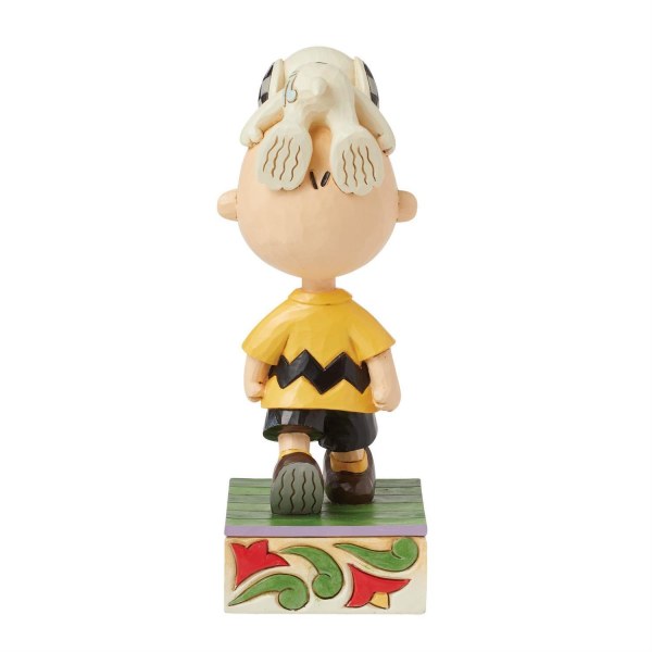 Snoopy sur la tête de Charlie Brown - Peanuts
