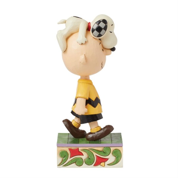 Snoopy sur la tête de Charlie Brown - Peanuts