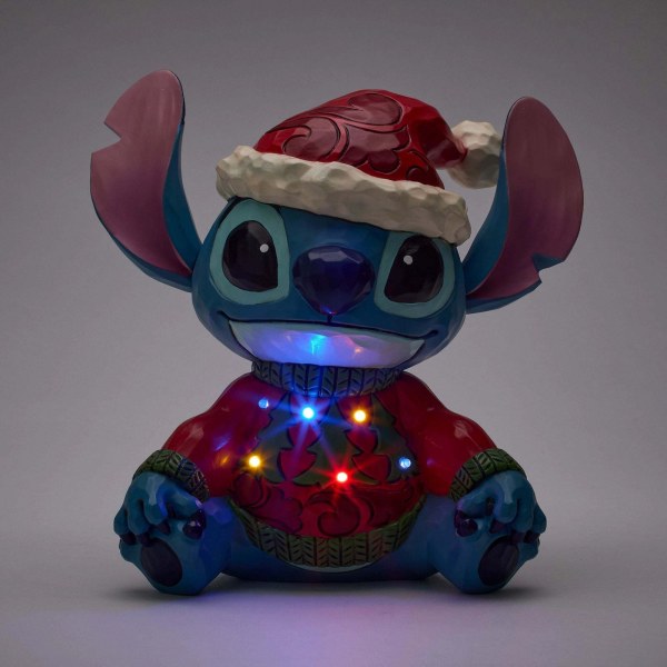STITCH AVEC UN PULL DE NOËL (LED) - DISNEY TRADITIONS