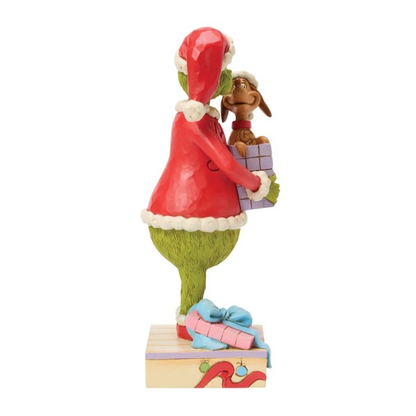 Le Grinch tenant un cadeau - JIM SHORE GRINCH