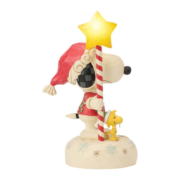 Snoopy avec son bâton étoile lumineux - Peanuts