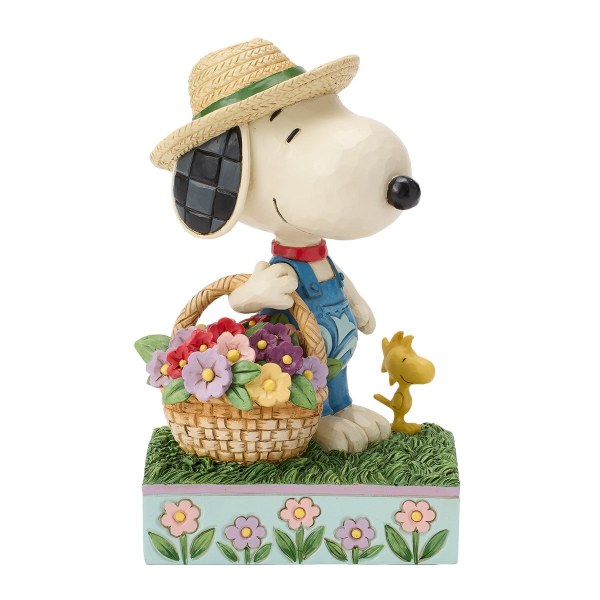 Snoopy tenant un panier de fleurs - Peanuts