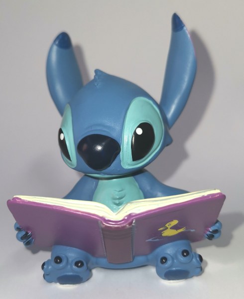 MINI STITCH AVEC LIVRE - DISNEY SHOWCASE