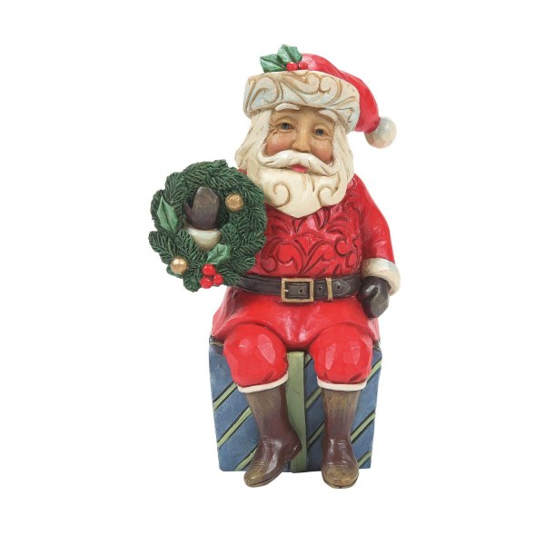 PÈRE NOËL ASSIS SUR UN CADEAUX - JIM SHORE HEARTWOOD CREEK