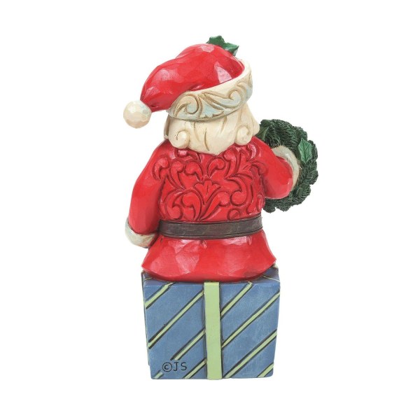PÈRE NOËL ASSIS SUR UN CADEAUX - JIM SHORE HEARTWOOD CREEK